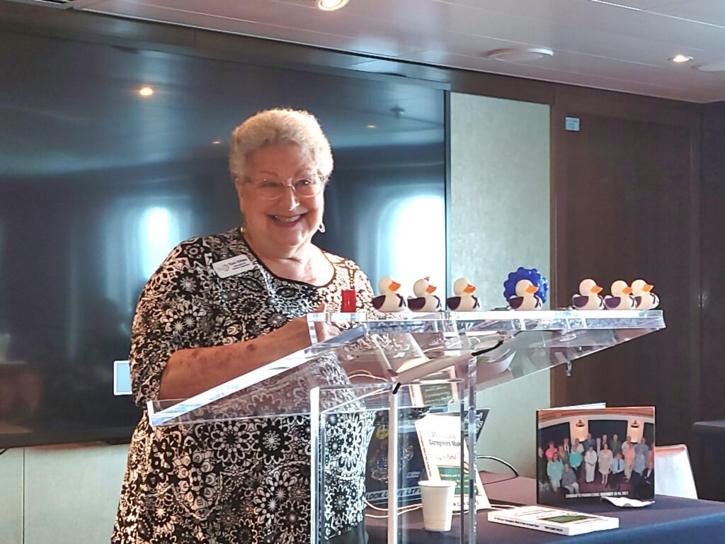 Toni on dementia friendly cruise at the podium